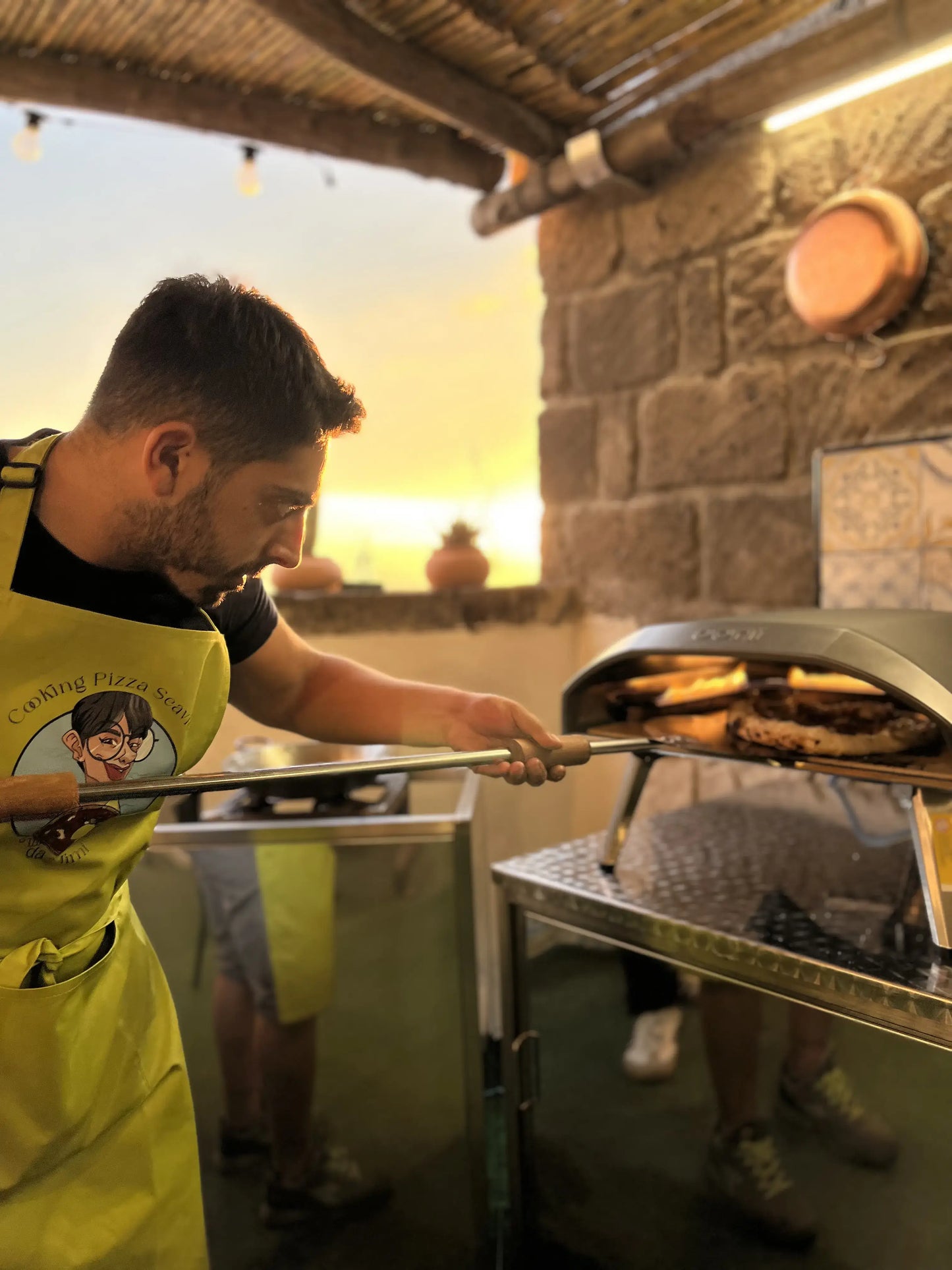 pizza making at sunset