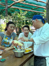 Participants enjoying a gluten free cooking class with a professional chef in Sorrento, Italy.